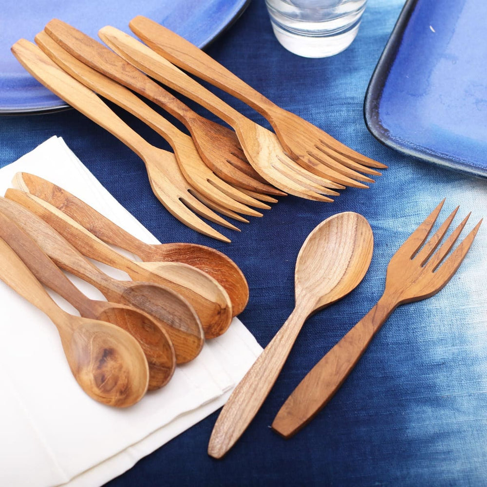 https://www.discovered.us/cdn/shop/files/novica-natures-course-teak-wood-fork-spoon-12-piece-handmade-discovered-291_1000x1000.jpg?v=1686228887
