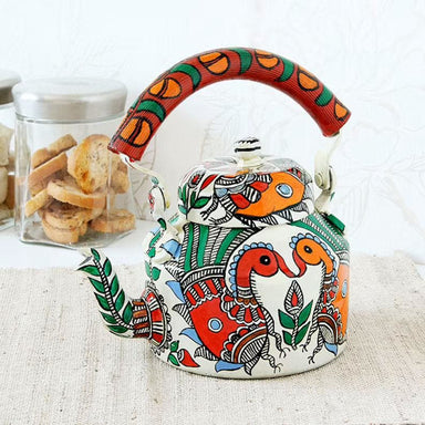 https://www.discovered.us/cdn/shop/products/kaushalam-hand-painted-tea-kettle-peacocks-in-madhubani-art-form-indian-pot-handmade-mrinalika-jain-discovered-421_384x384.jpg?v=1664587573