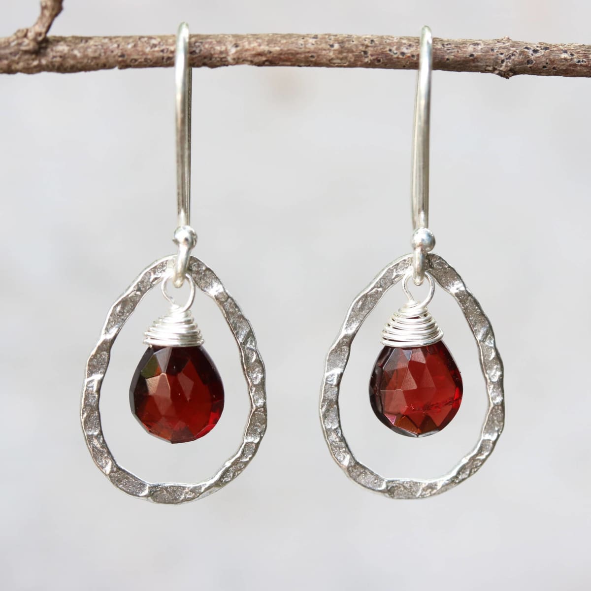 Silver drop earring with garnet — Discovered